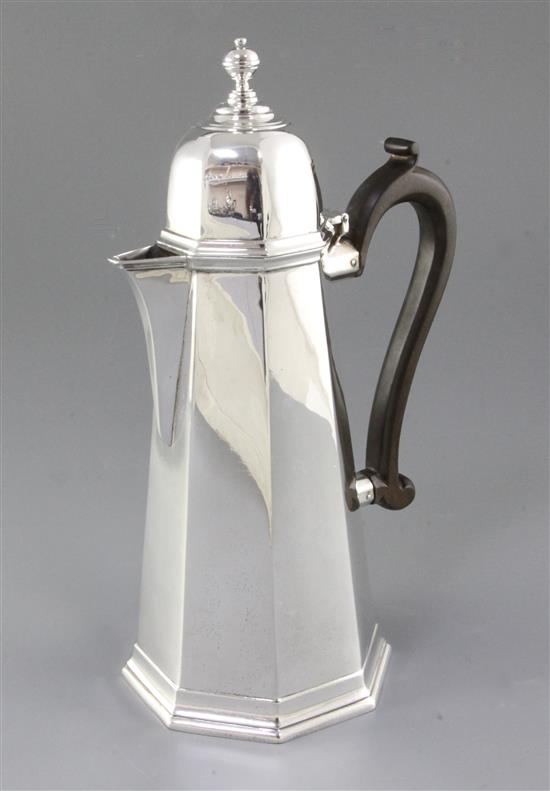 A George V early 18th century style silver coffee pot, by Goldsmiths & Silversmiths Co Ltd, height 297mm gross eight 28oz/793grms
